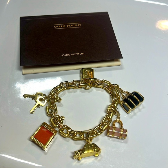 Louis Vuitton Jewelry - LOUIS VUITTON 2003 18KT GOLD CHARM BRACELET W/ 5 CHARMS